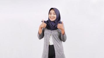 asian woman smiling gesture ok isolated on white background photo