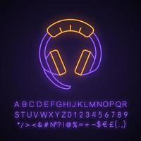 Gaming headset neon light icon. Esports equipment. Computer headphones with microphone. Game device. Glowing sign with alphabet, numbers and symbols. Vector isolated illustration