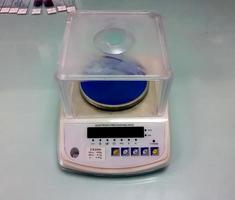 Electronic balance isolated in laboratory photo