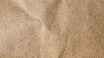 Macro shot of kraft paper as background in beige color photo