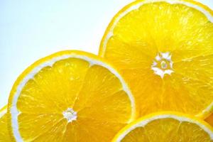 Orange slices sliced on a plate close-up photo