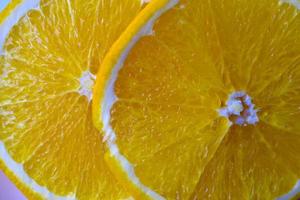 Orange slices sliced on a plate close-up photo