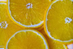 Orange slices sliced on a plate close-up photo