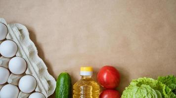 Products lie on the background, eggs cereals and vegetables photo
