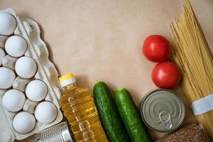 Products lie on the background, eggs cereals and vegetables photo