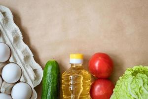 Products lie on the background, eggs cereals and vegetables photo