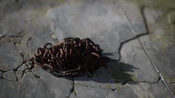 Vintage rusty hand-made iron chain photo