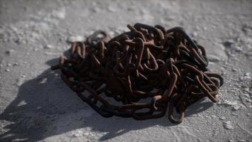 Vintage rusty hand-made iron chain photo