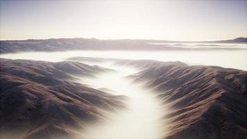 mountain landscape with deep fog at morning photo