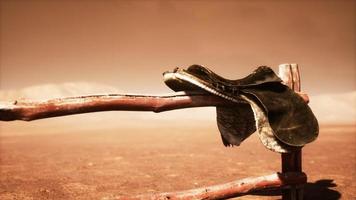 Horse Saddle on the Fence in Monument Valley photo