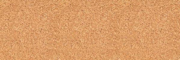 corkboard or pinboard or bulletin board cork background in wide banner or header format photo