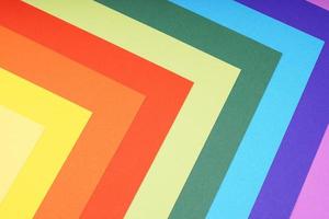 rainbow colored paper background with angular pattern photo