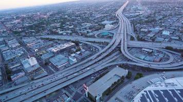 4K Aerial Sequence of Los Angeles, USA - Wide angle view The Highway 10 and 110 at dusk as seen from a helicopter video