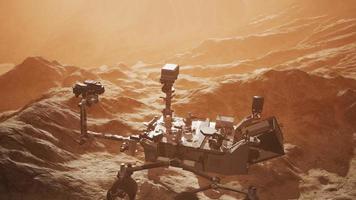 Curiosity Mars Rover exploring the surface of red planet photo