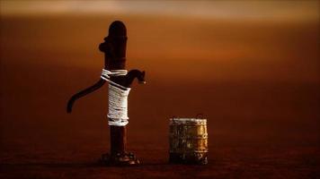 old rusted metal well in desert photo