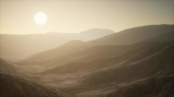 Mountains landscape in Afghanistan at sunset photo