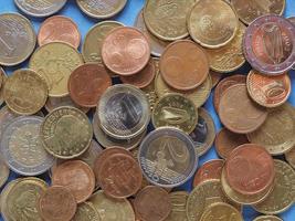 Euro coins, European Union over blue photo