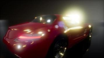 coche deportivo de lujo en estudio oscuro con luces brillantes foto