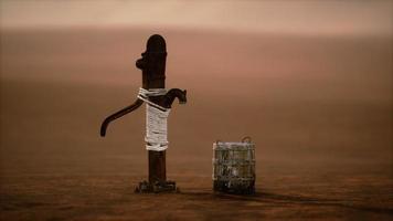 old rusted metal well in desert photo