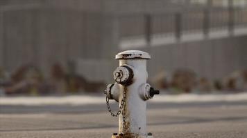 Rusty Fire Hydrant at sunny day photo