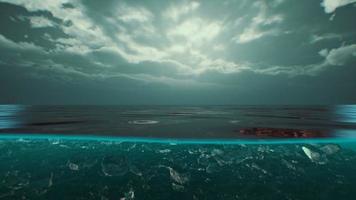 Split view over and under water in the Caribbean sea with clouds photo