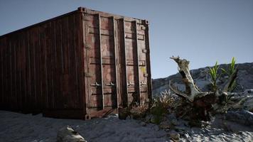 abandoned shipping container in the desert photo