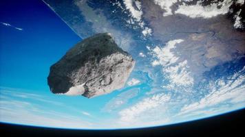 Dangerous asteroid approaching planet Earth photo