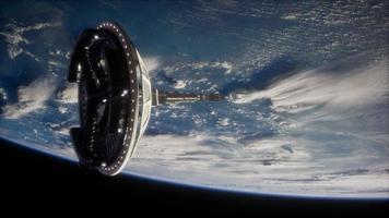 futuristic Space satellite orbiting the earth photo