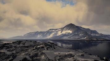 Mountains covered with ice in Antarctic landscape photo