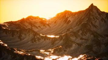 Aerial view of the Alps mountains in snow photo