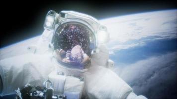 Astronaut at spacewalk. Elements of this image furnished by NASA photo