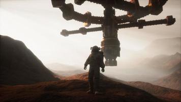 Astronaut walking on an Mars planet photo