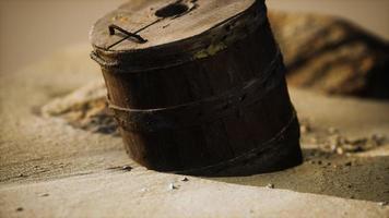 old wooden basket on the sand at the beach photo