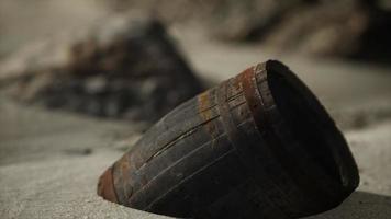 Old wooden barrel on the beach photo