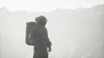 astronaut on another planet with dust and fog photo