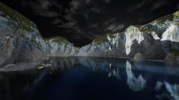 fjord with dark storm clouds photo