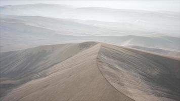 Red Sand Desert Dunes in Fog photo