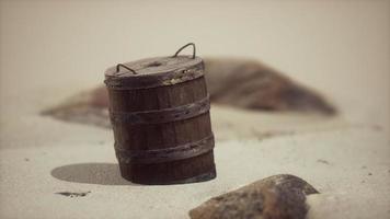 old wooden basket on the sand at the beach photo