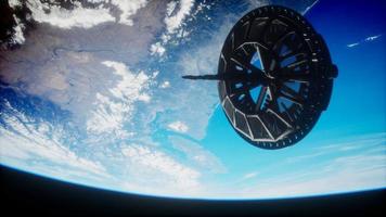 futuristic Space satellite orbiting the earth photo