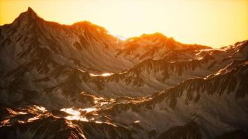 Aerial view of the Alps mountains in snow photo