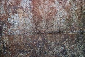 Old grunge rusty metal texture with scratches and crack. Vintage dark rustic metal background.