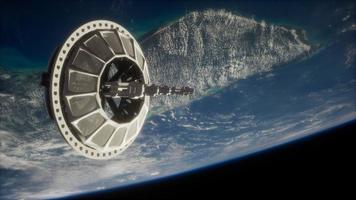 futuristic Space satellite orbiting the earth photo