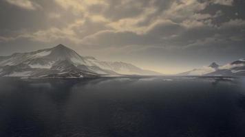 Mountains covered with ice in Antarctic landscape photo