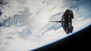 futuristic Space satellite orbiting the earth photo