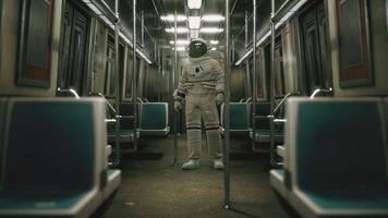 Astronaut Inside of the old non-modernized subway car in USA photo