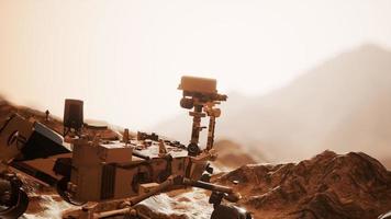 Curiosity Mars Rover exploring the surface of red planet photo