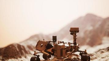 Curiosity Mars Rover exploring the surface of red planet photo