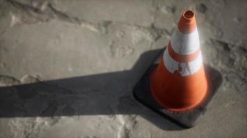 orange and white striped traffic cone photo