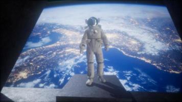 astronaut on the space observatory station near Earth photo