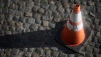 orange and white striped traffic cone photo